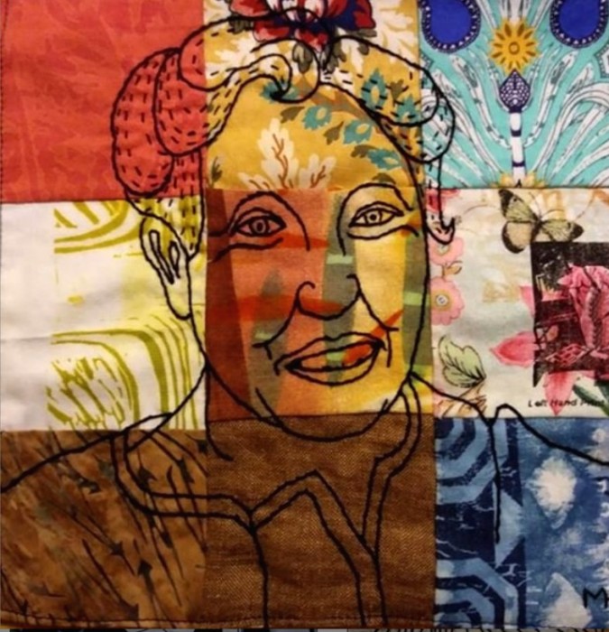 a closeup portrait of woman with short hair stitched in black thread over a 3x3 grid patchwork of colorful patterned fabrics